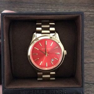 Michael Kors small runway, gold & mandarin face